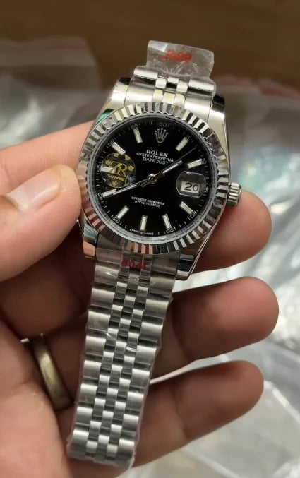 Rolex DateJust Silver-Black Fluted Bezel Jubilee 36MM Ladies