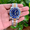 Rolex Submariner ذهبي-فضي بمينا أزرق