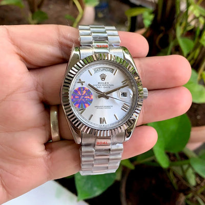 Rolex DayDate Fluted Bezel Roman White Dial Yz