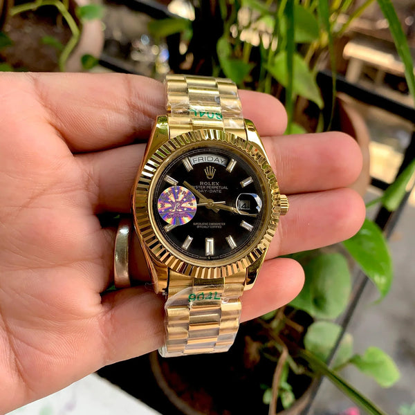 Rolex DayDate Gold Black Fluted Bezel Yz
