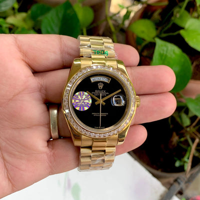 Rolex DayDate Gold Black Dial Diamond Bezel